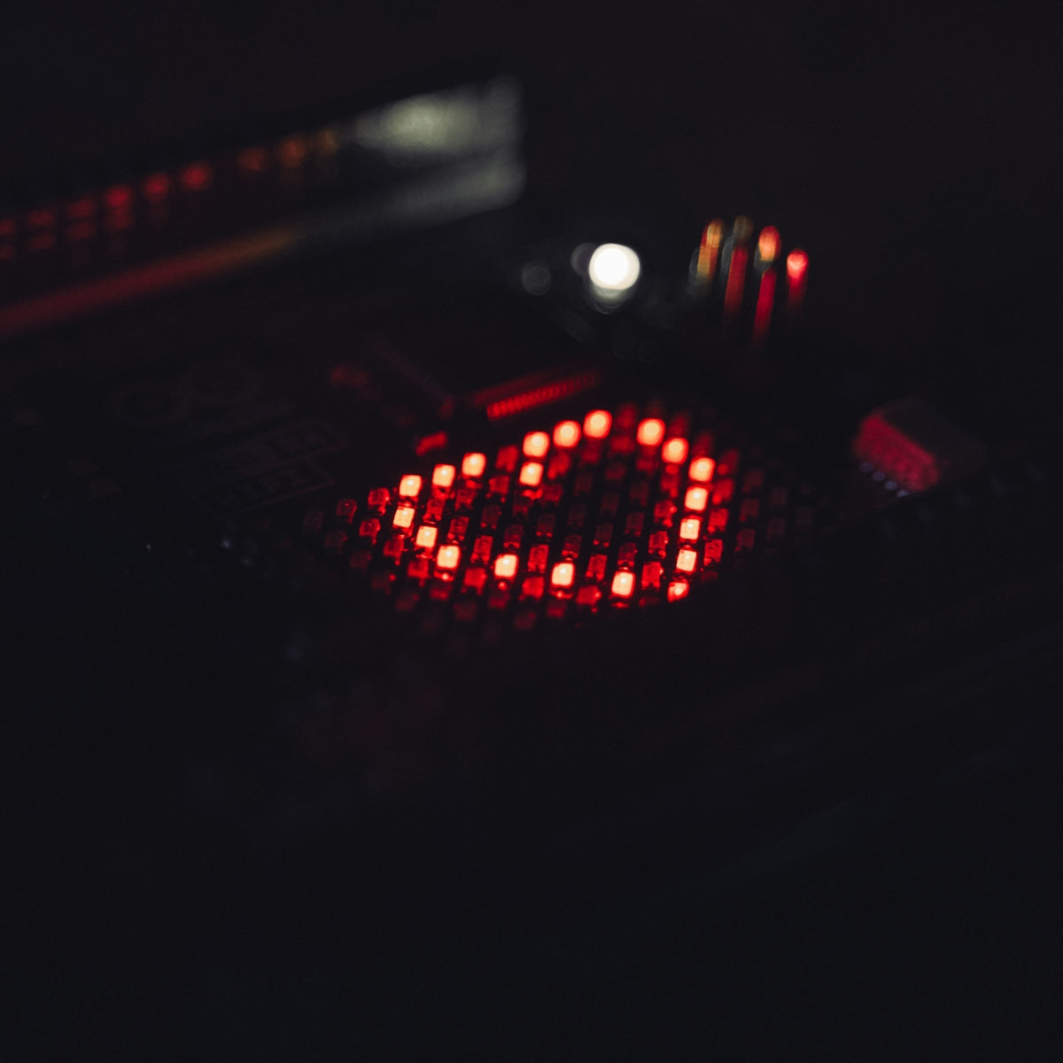 A close up of a red light in the dark