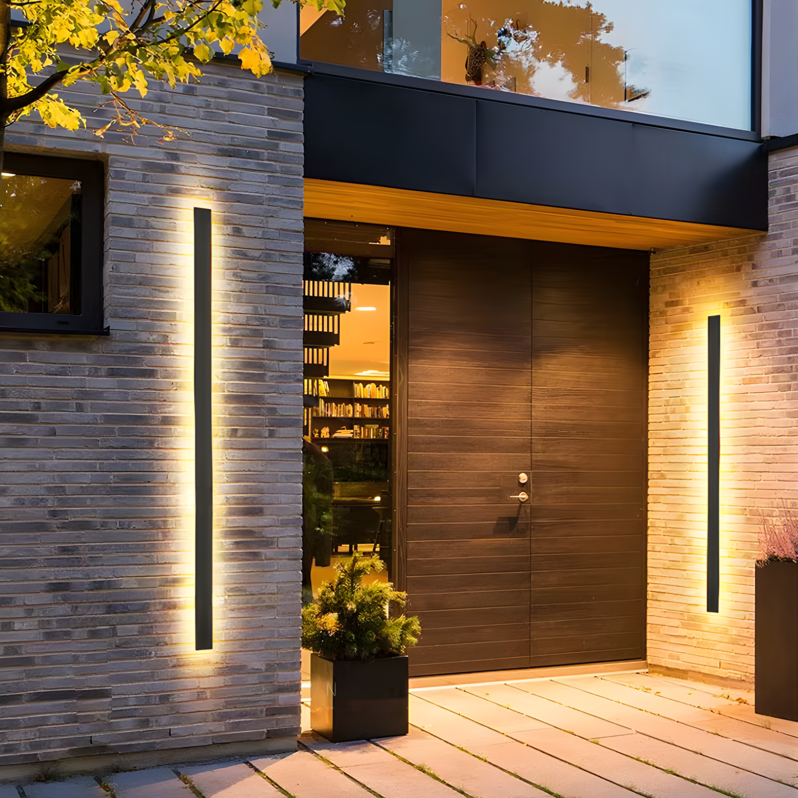 Modern house entrance with wooden door and wall lights