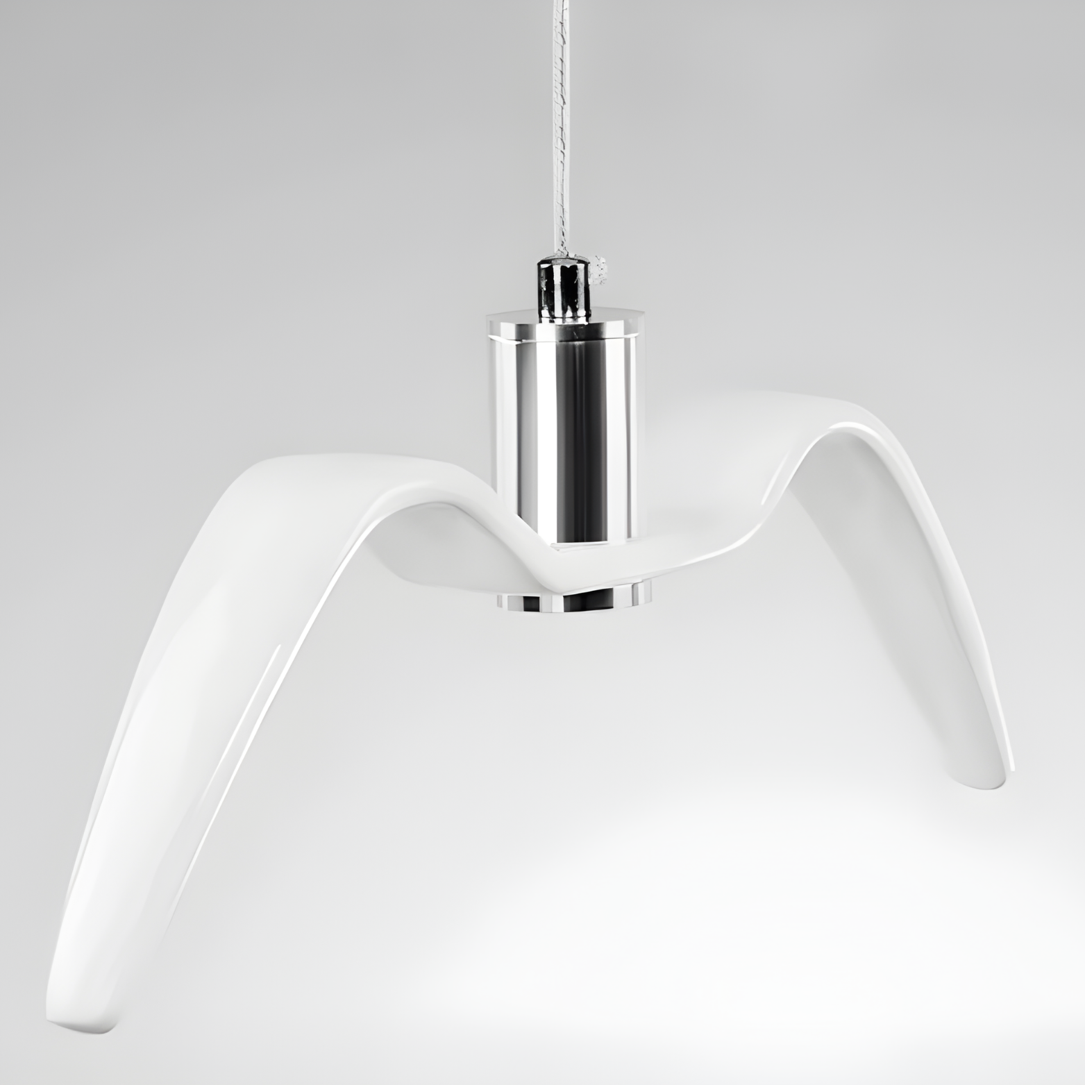 Modern pendant light with white shade and chrome fixture on a gray background