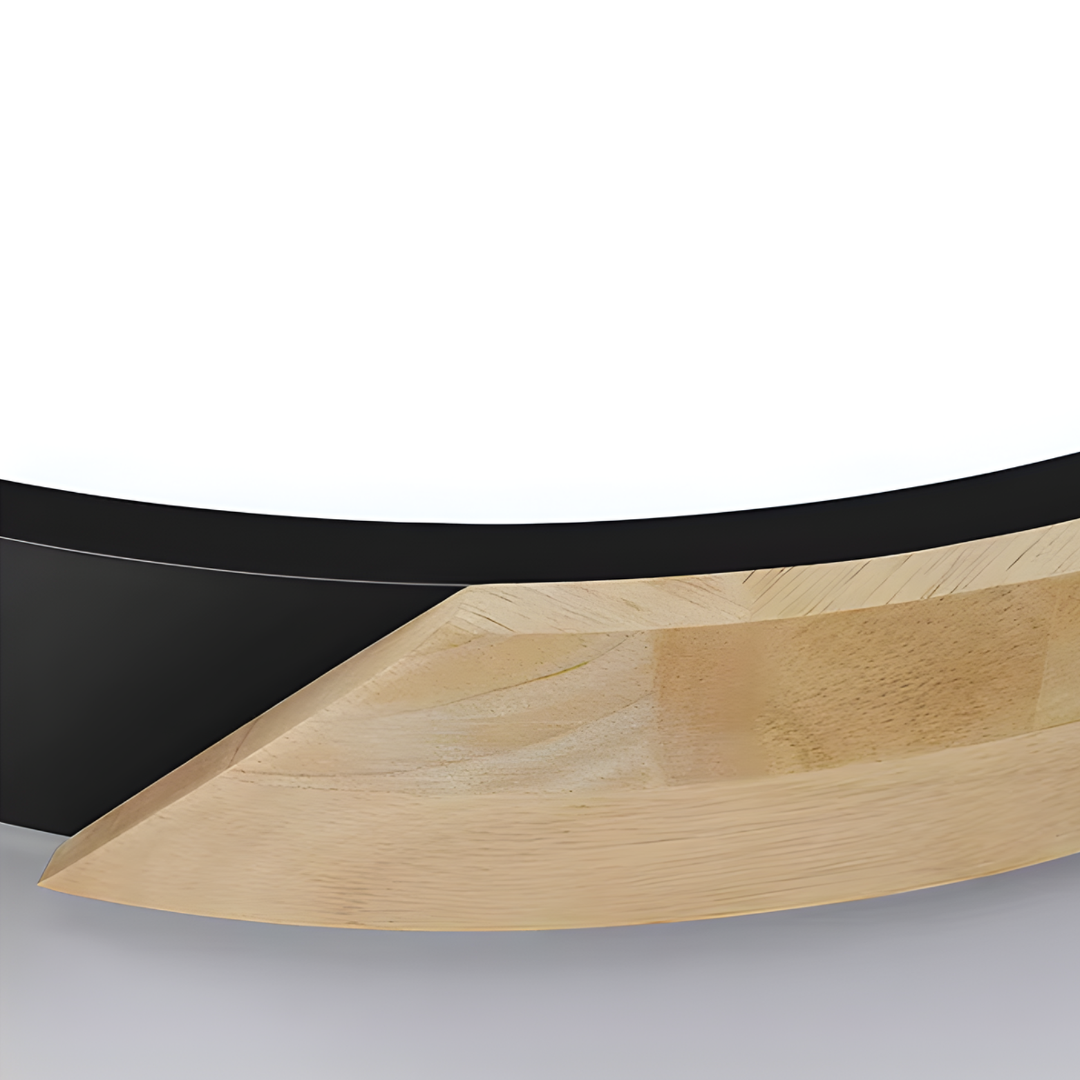 Close-up of a knife with black handle and wooden blade on a white background