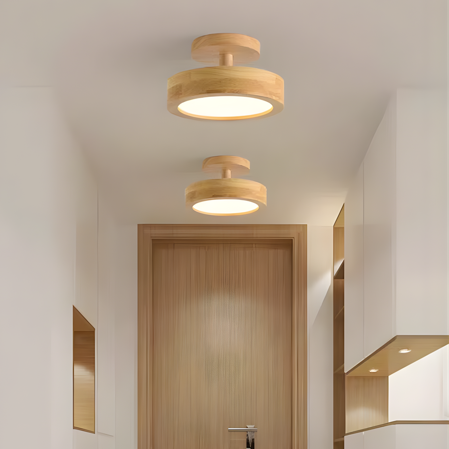 Two wooden ceiling lights in a modern interior setting with a door and wall.