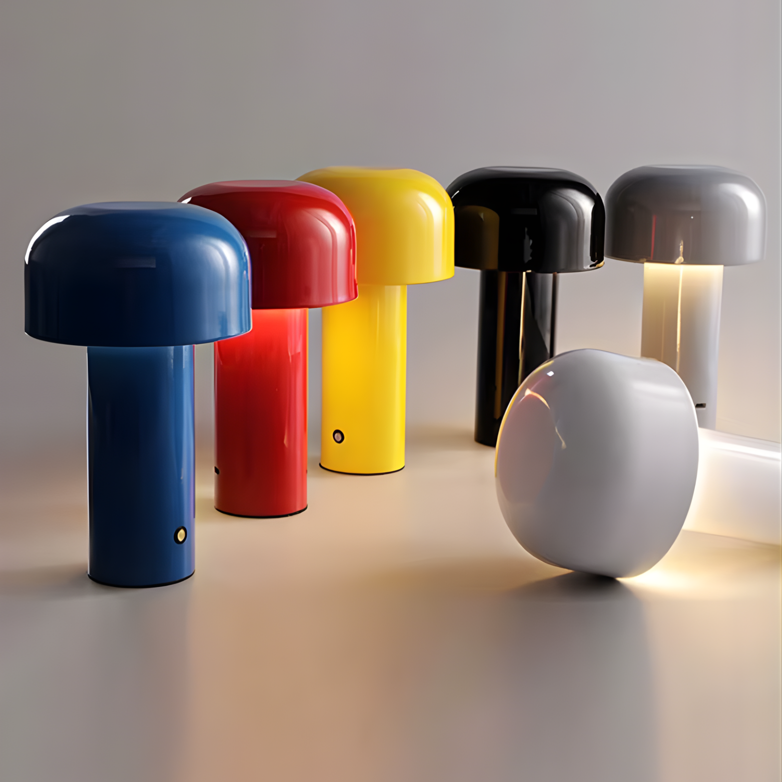 Set of colorful mushroom-shaped lamps on a neutral background