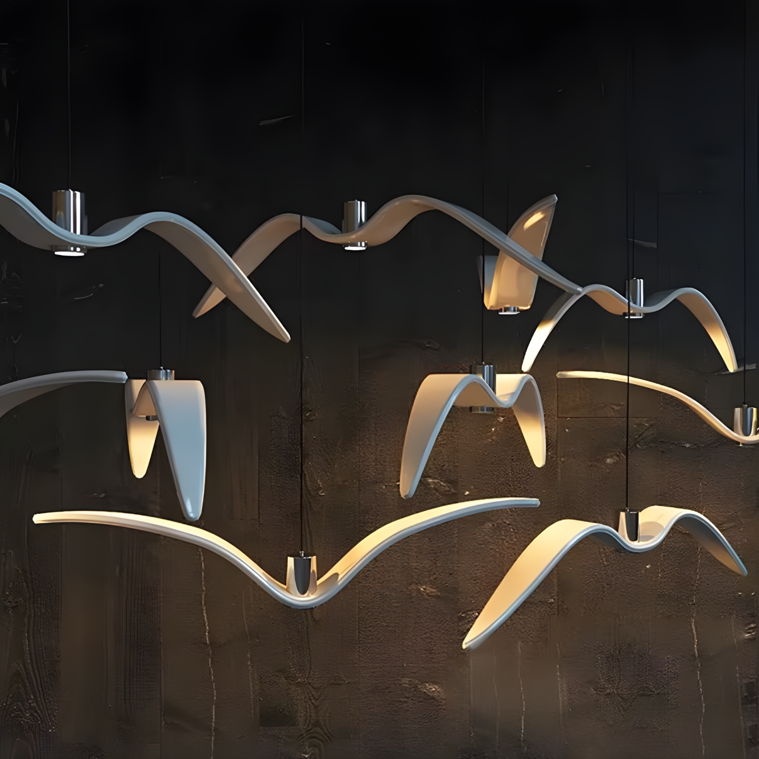 Modern chandelier with wavy design on a dark background