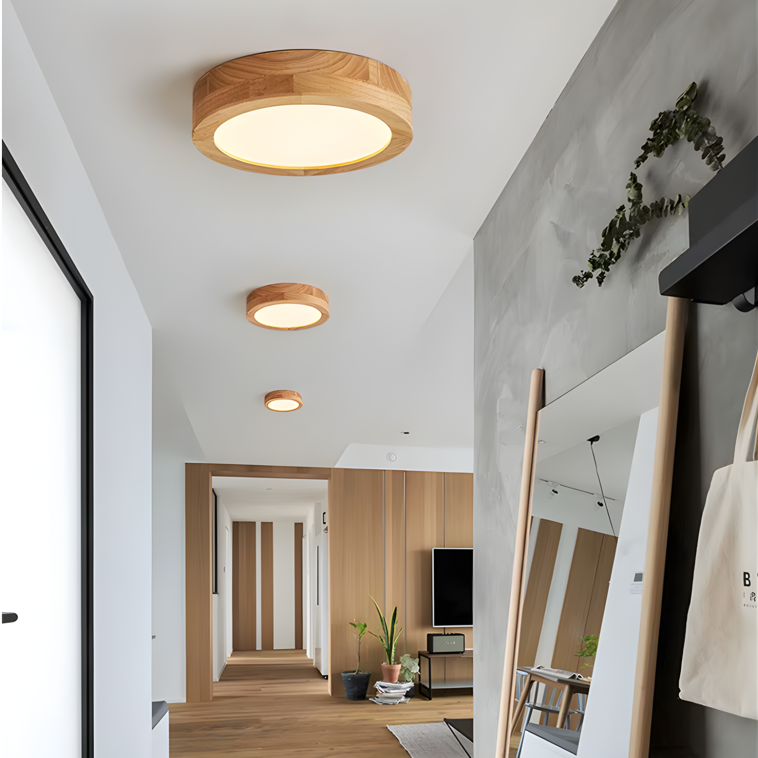 Modern interior with wooden ceiling lights and a view into another room.