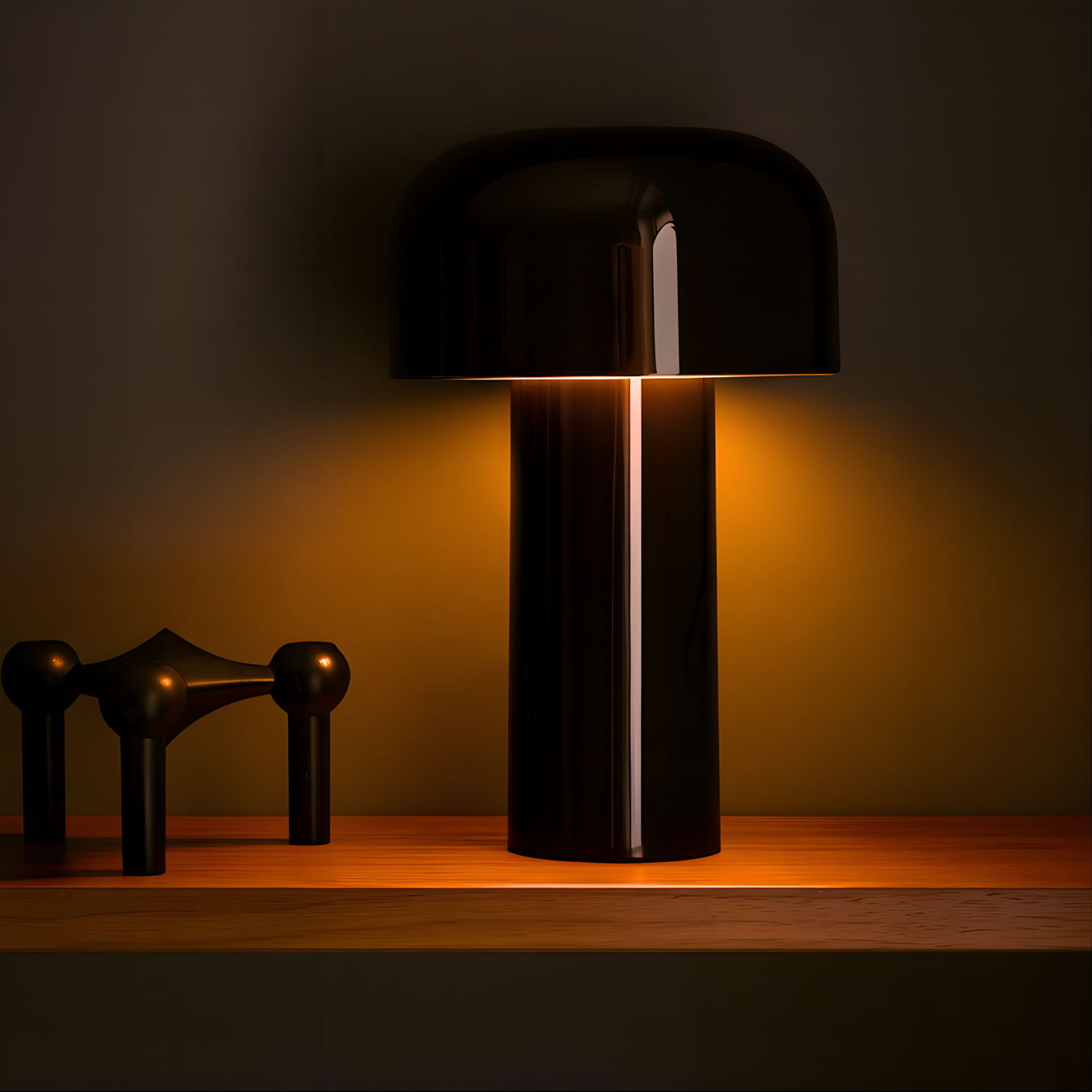 Modern black table lamp on a wooden surface with a dark background