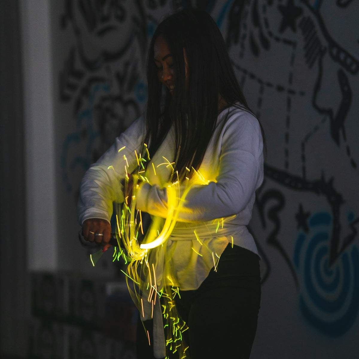 woman holding LED light