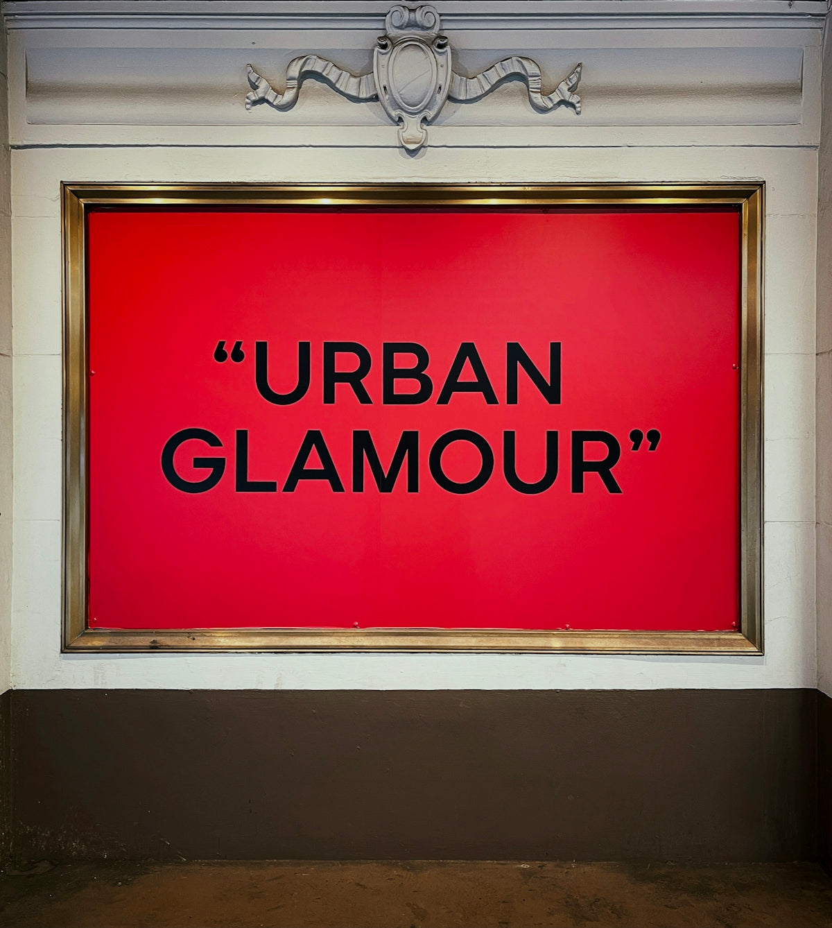 a large red sign that says urban glamour