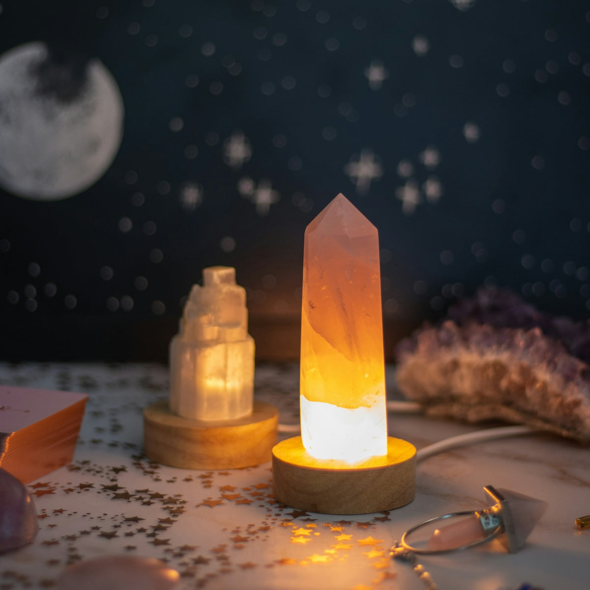 a table topped with lots of different types of lights