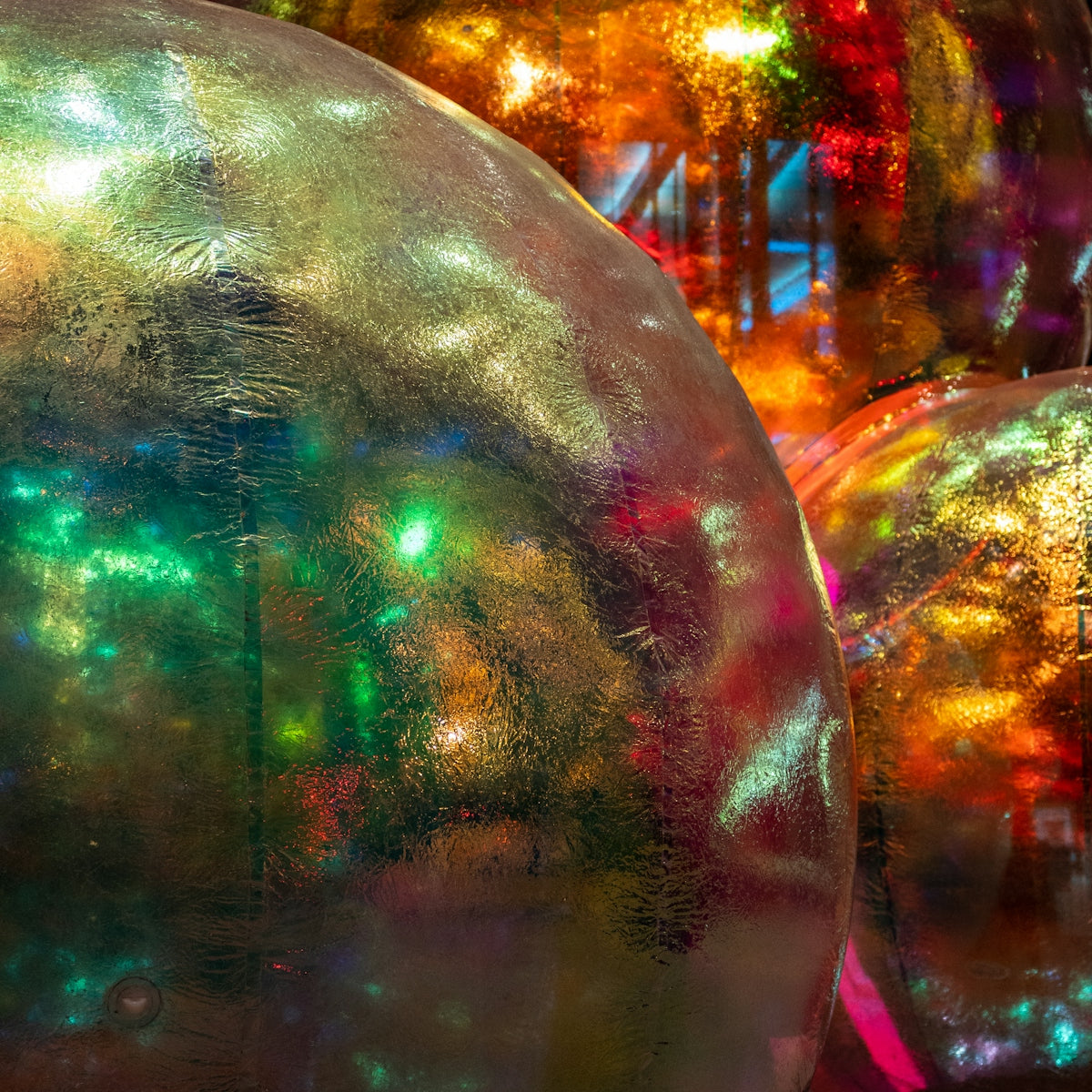 a close up of a bunch of shiny balls