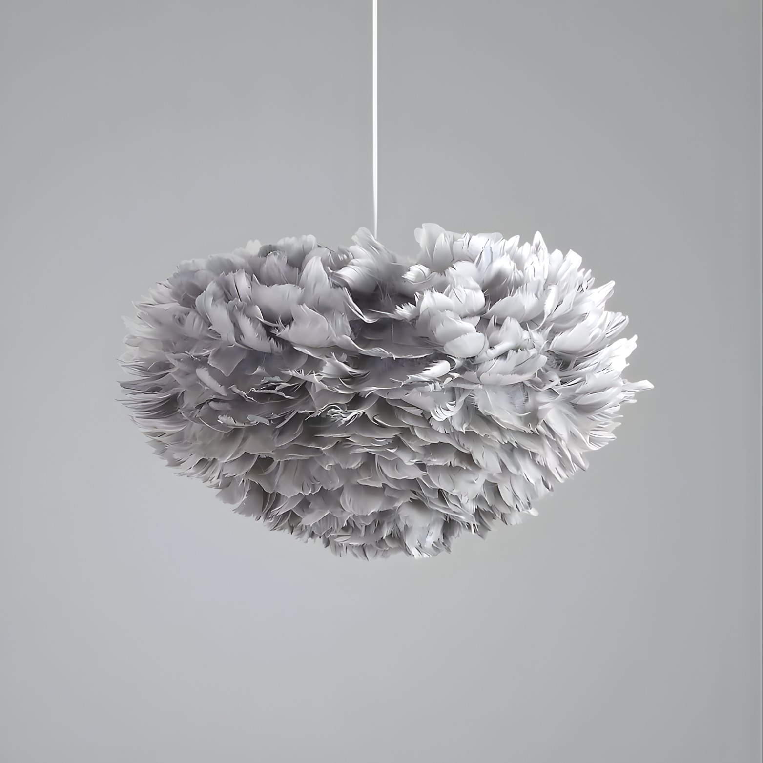 Fluffy gray pendant light on a plain background