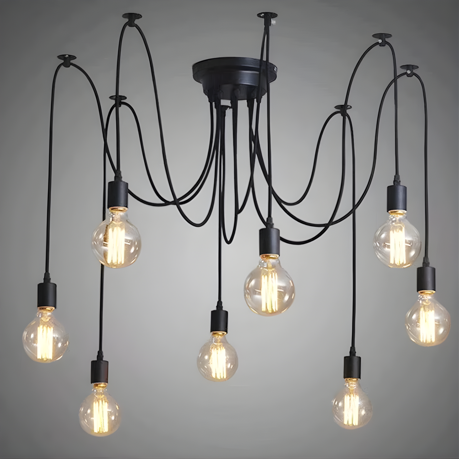 Modern chandelier with multiple hanging light bulbs on a gray background
