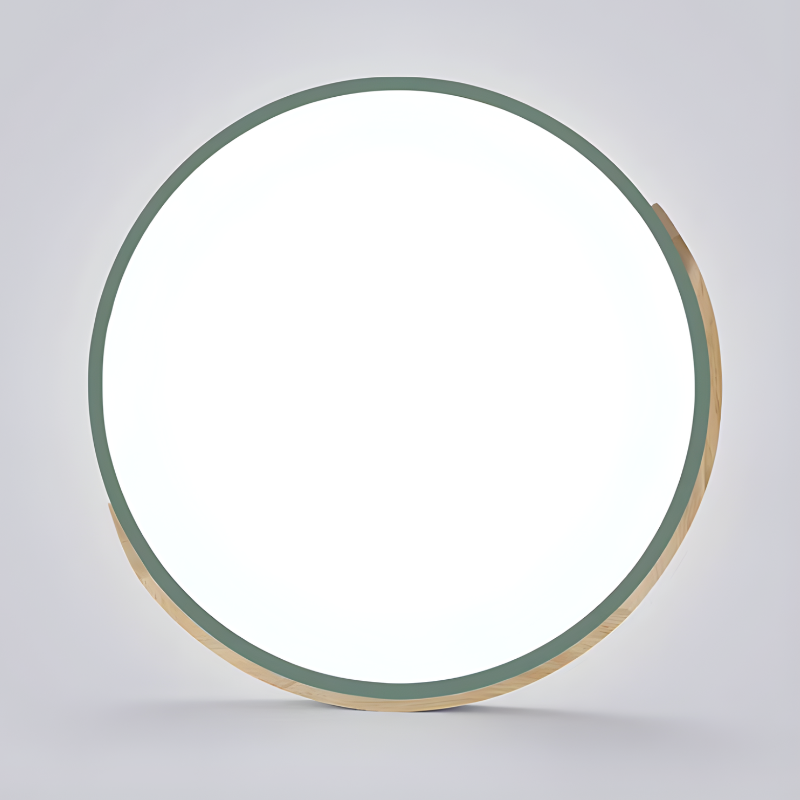 Round mirror with a green frame on a gray background