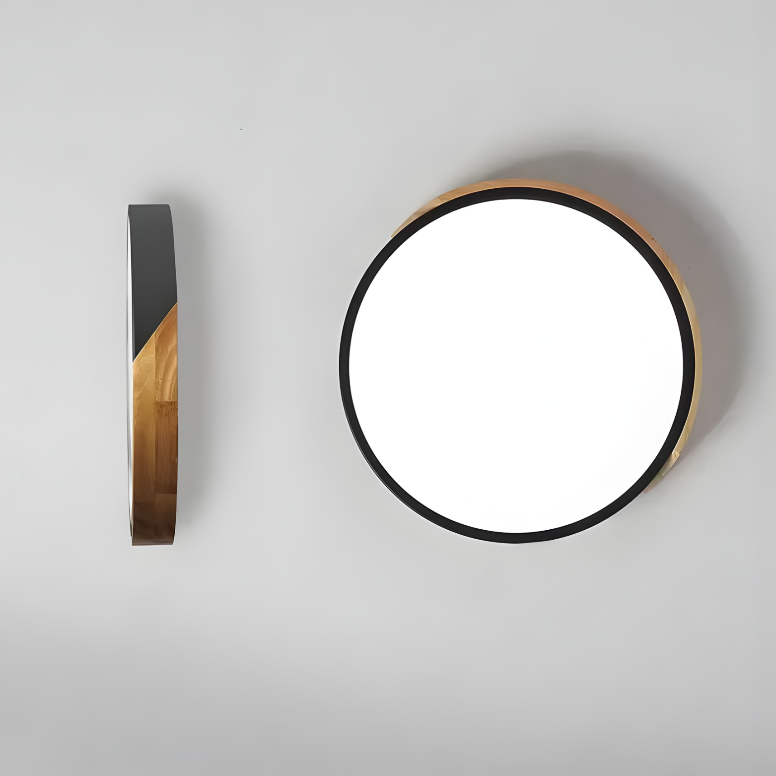 Round wall light fixture with wooden frame on a gray background
