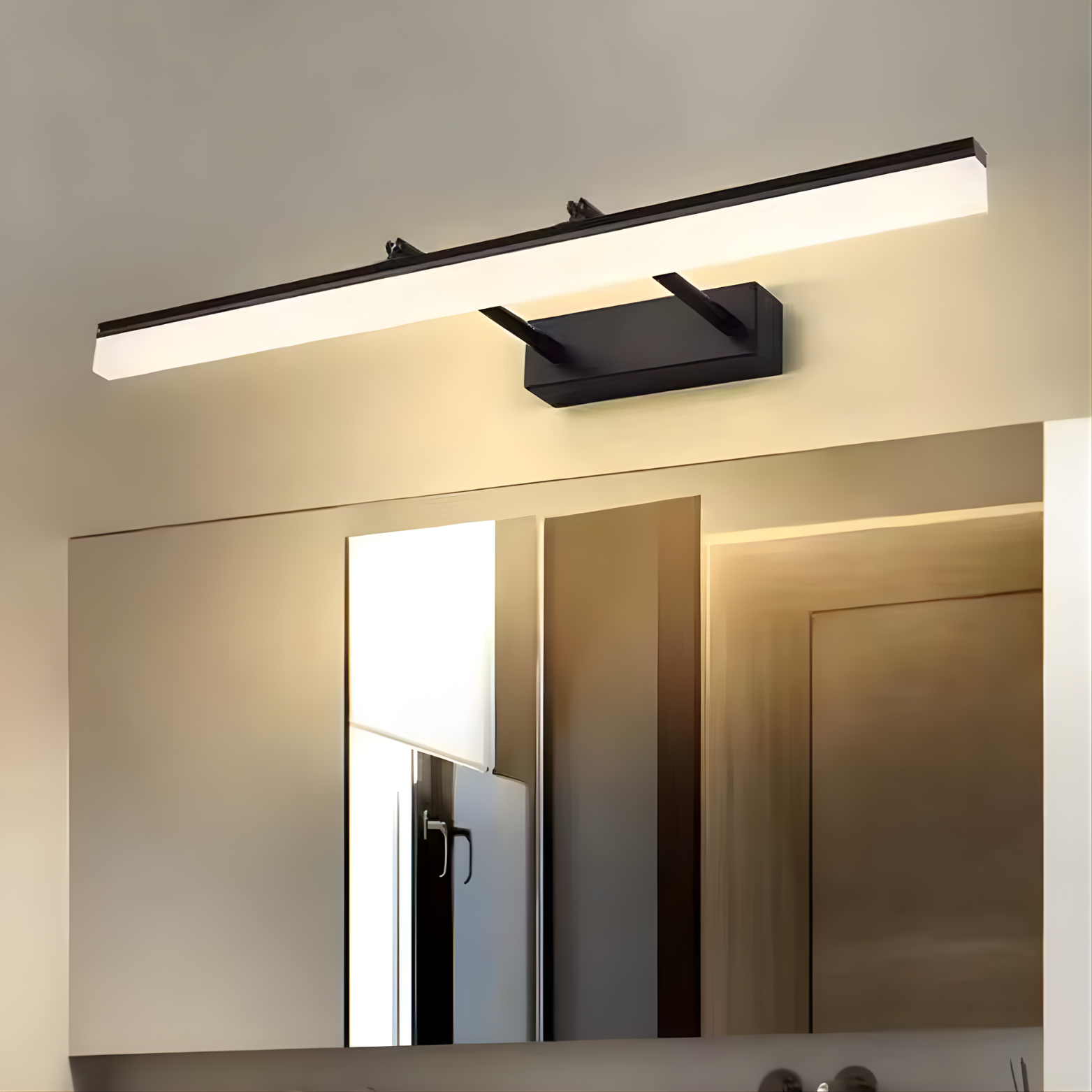 Modern bathroom light fixture above a mirror