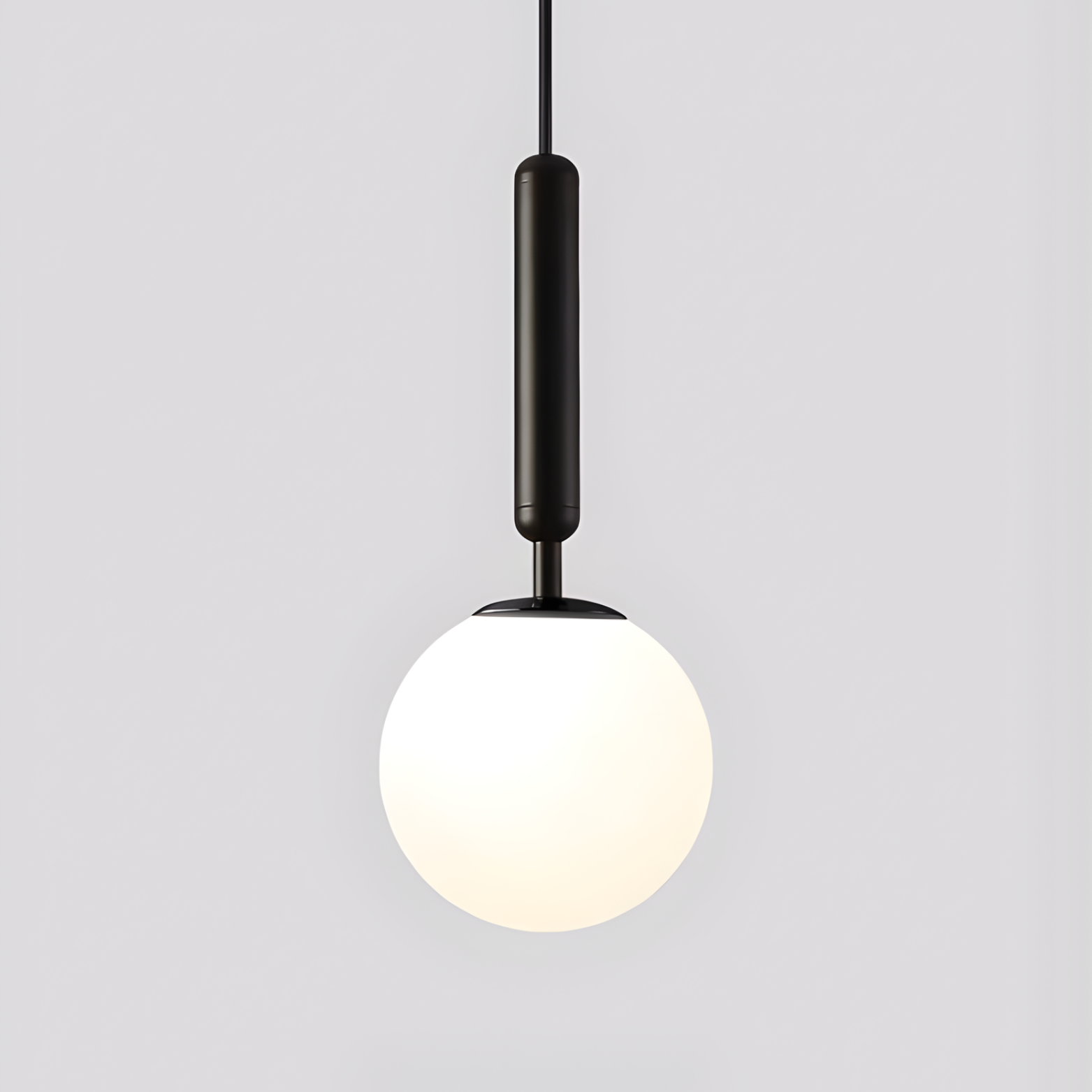 Modern pendant light with a white bulb and black fixture on a gray background