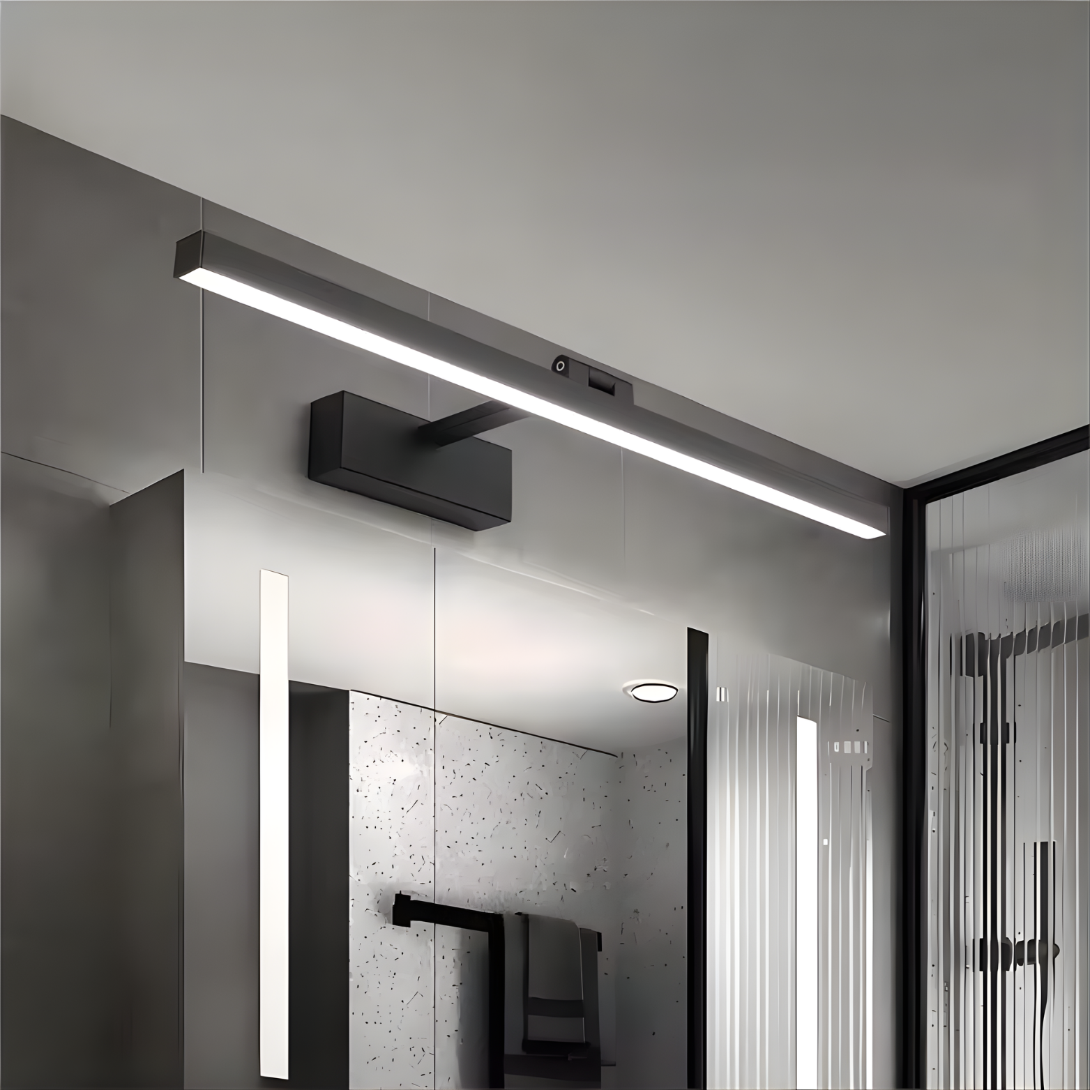 Modern bathroom setup with ceiling lights and mirrors.