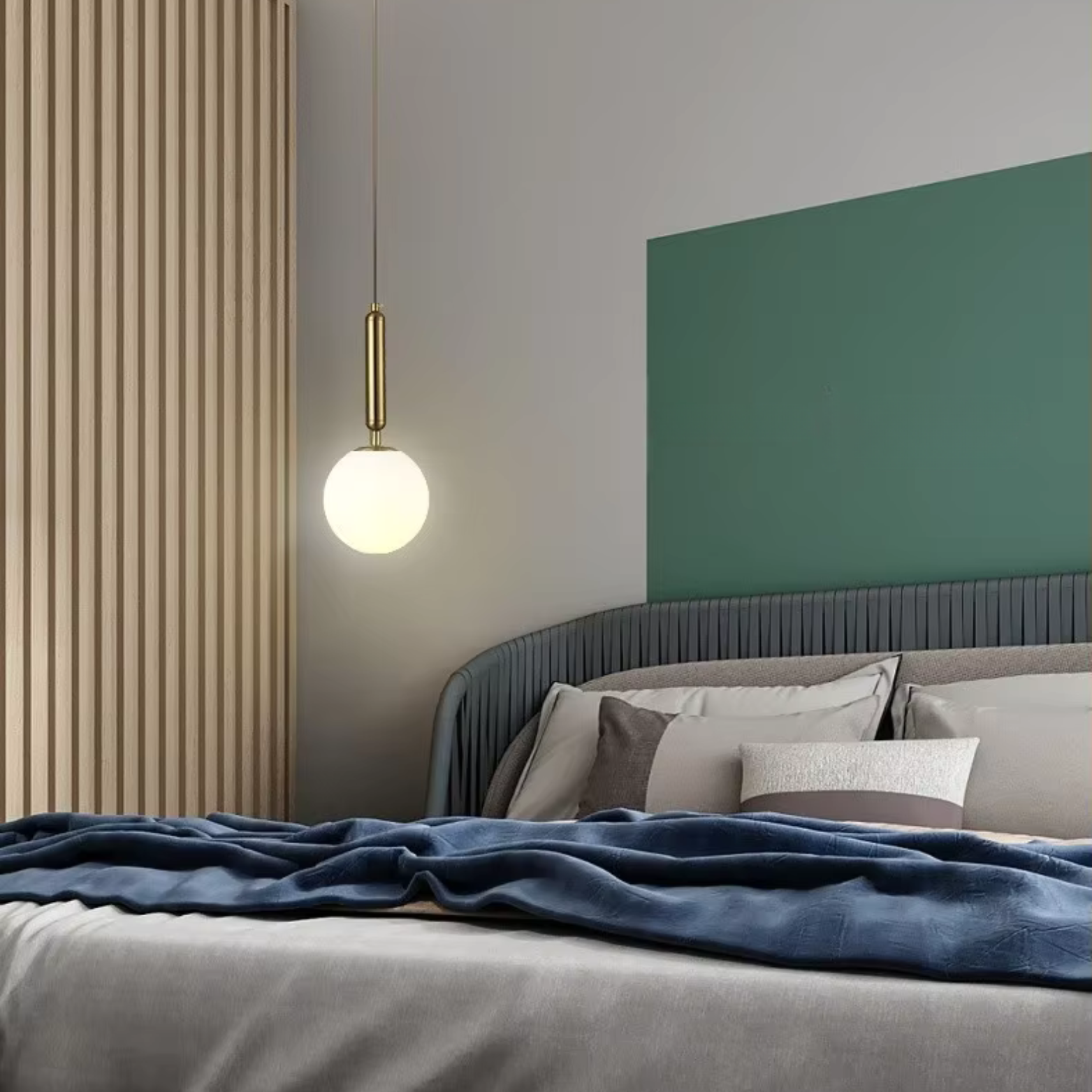 Modern bedroom with a bed, green headboard, and pendant light.