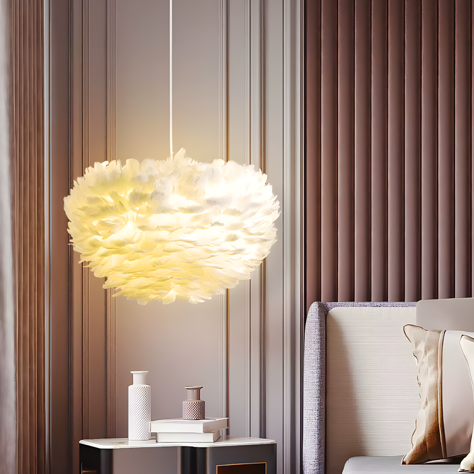 Modern pendant light hanging in a stylish room with striped walls and a sofa.