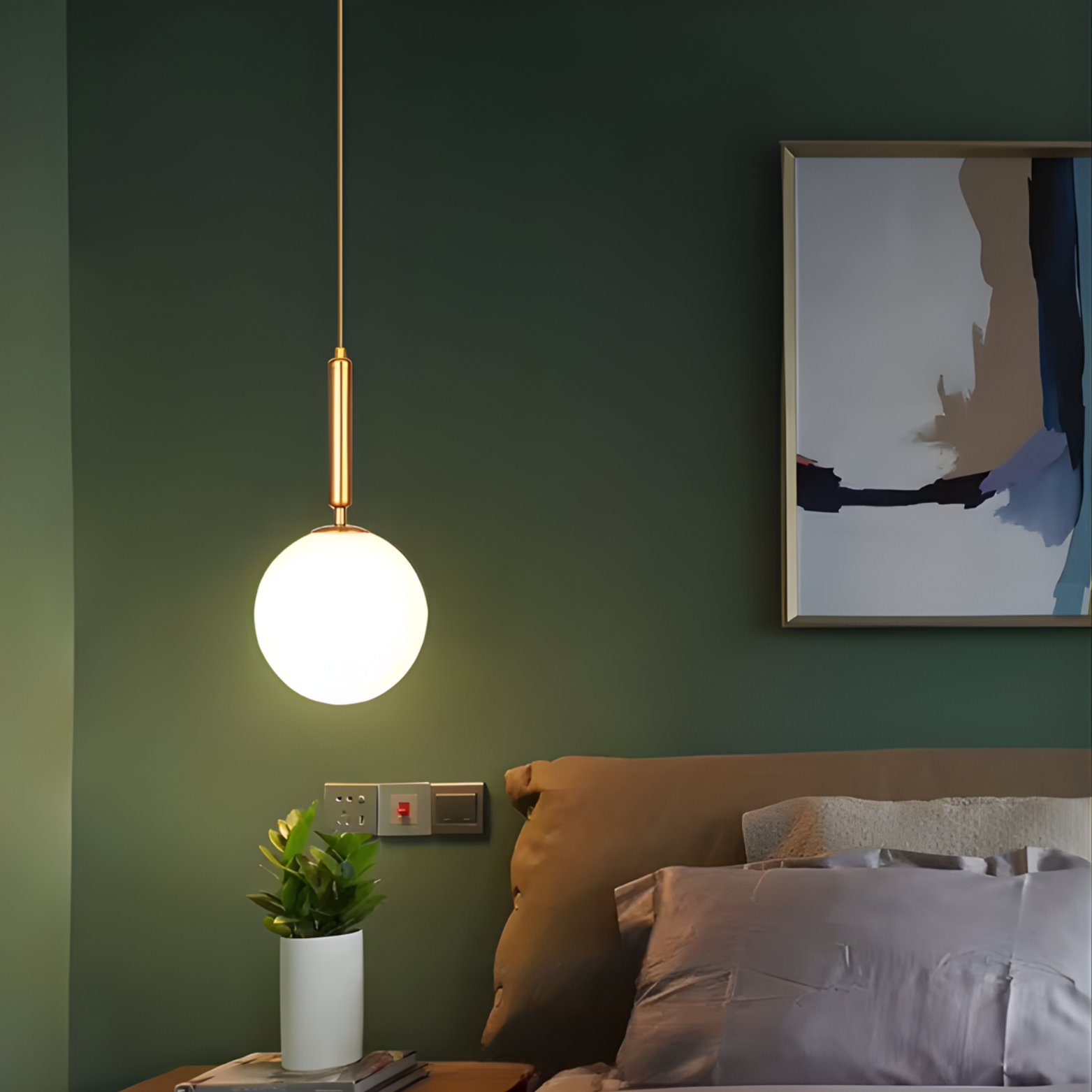 Modern bedroom with a pendant light, green wall, and abstract art.