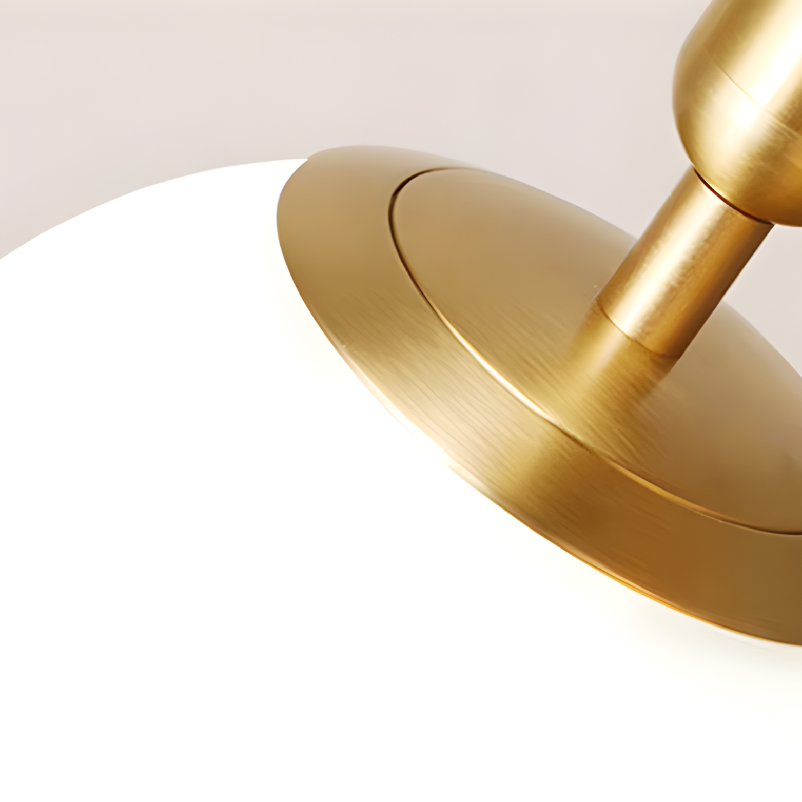 Gold door handle on a white background