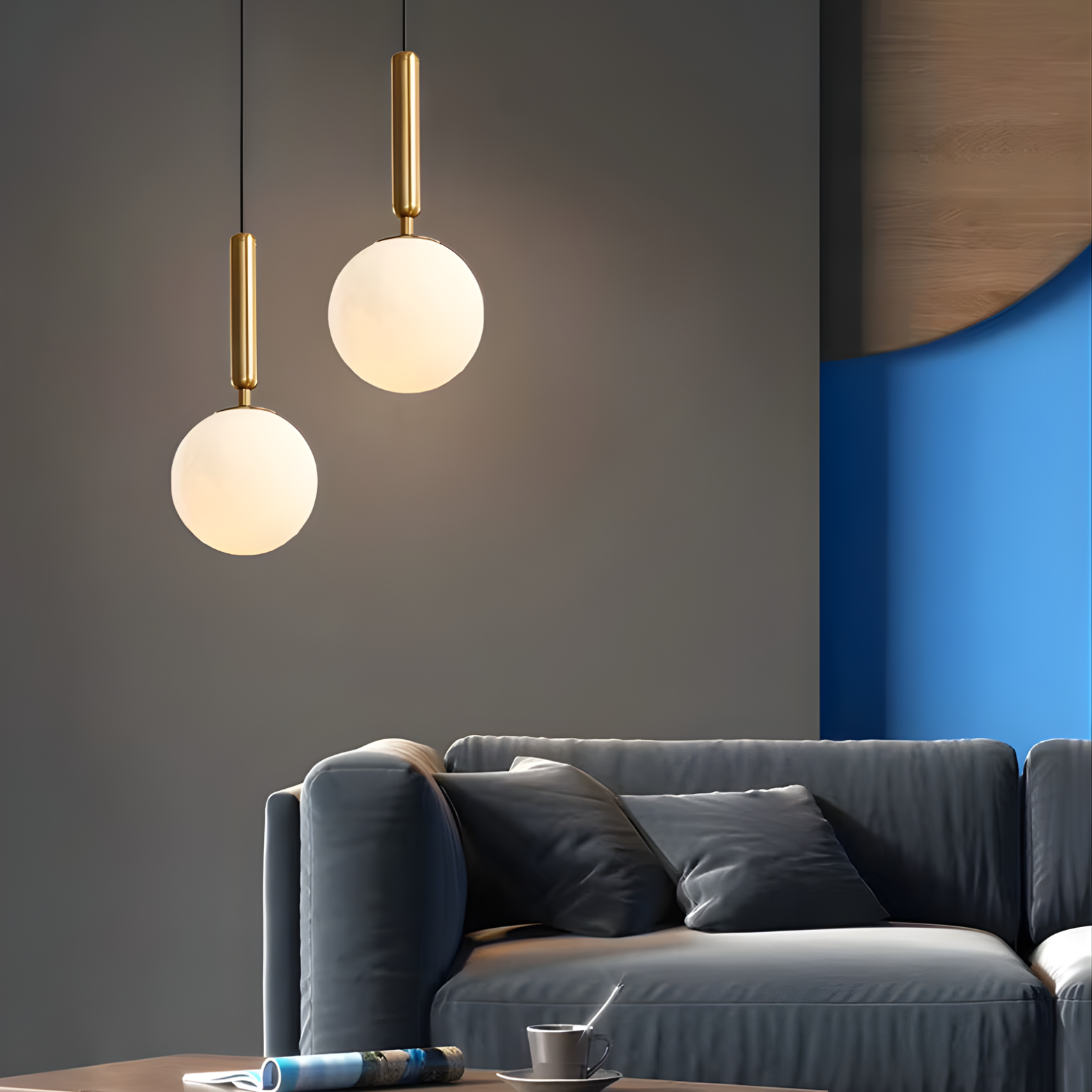 Modern living room with gray sofa, round pendant lights, and a blue wall.