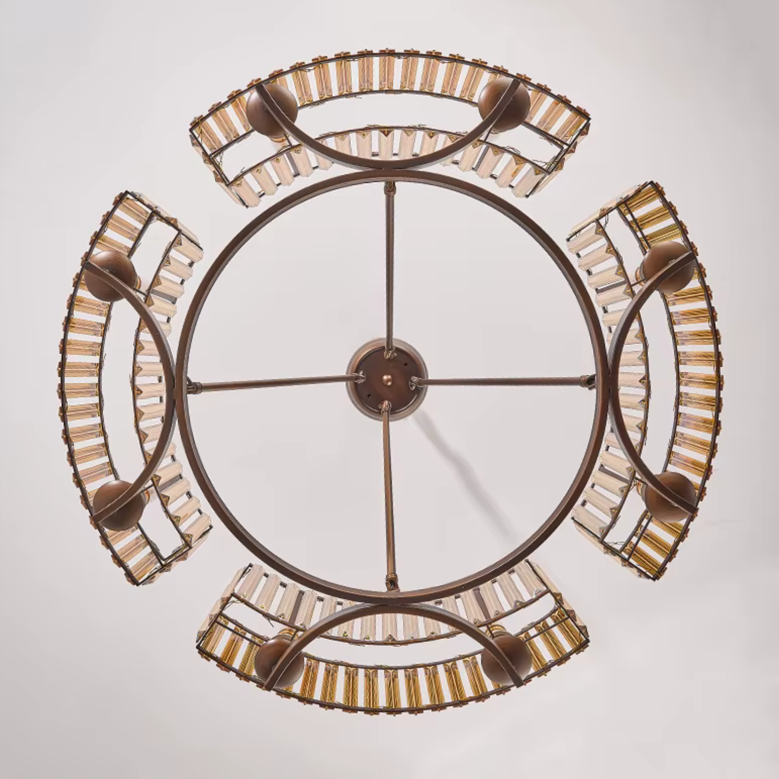 Decorative wall clock with intricate design on a light gray background