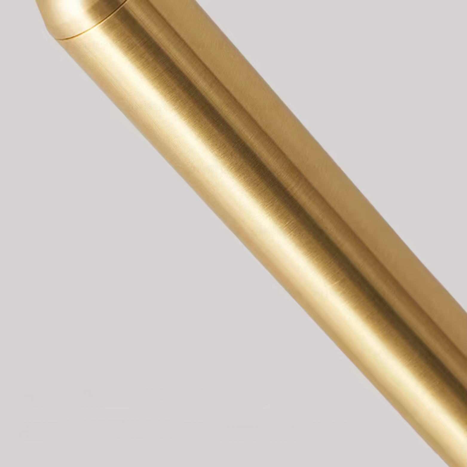Gold light on a light gray background
