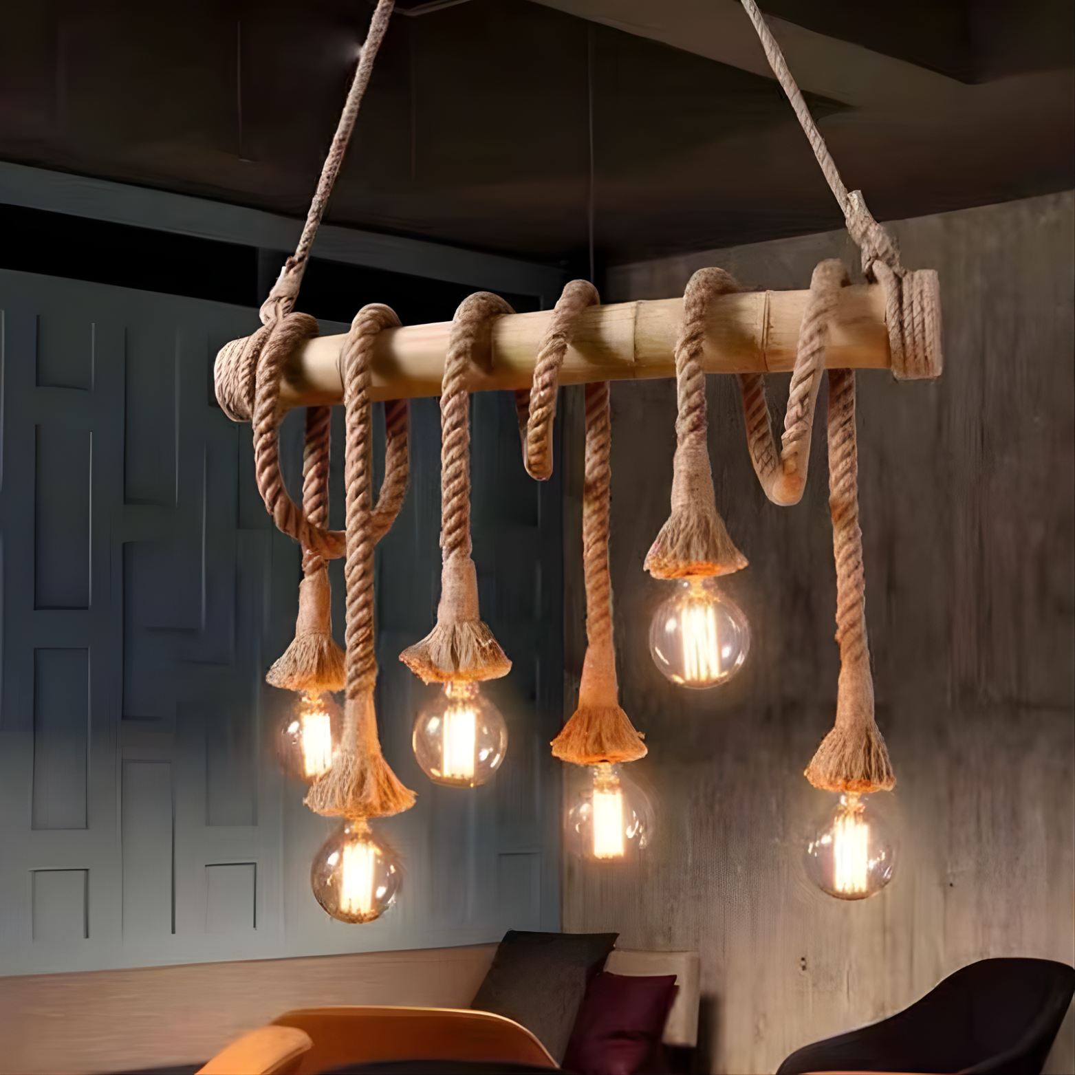 Rustic chandelier with rope design and hanging light bulbs in a room setting.