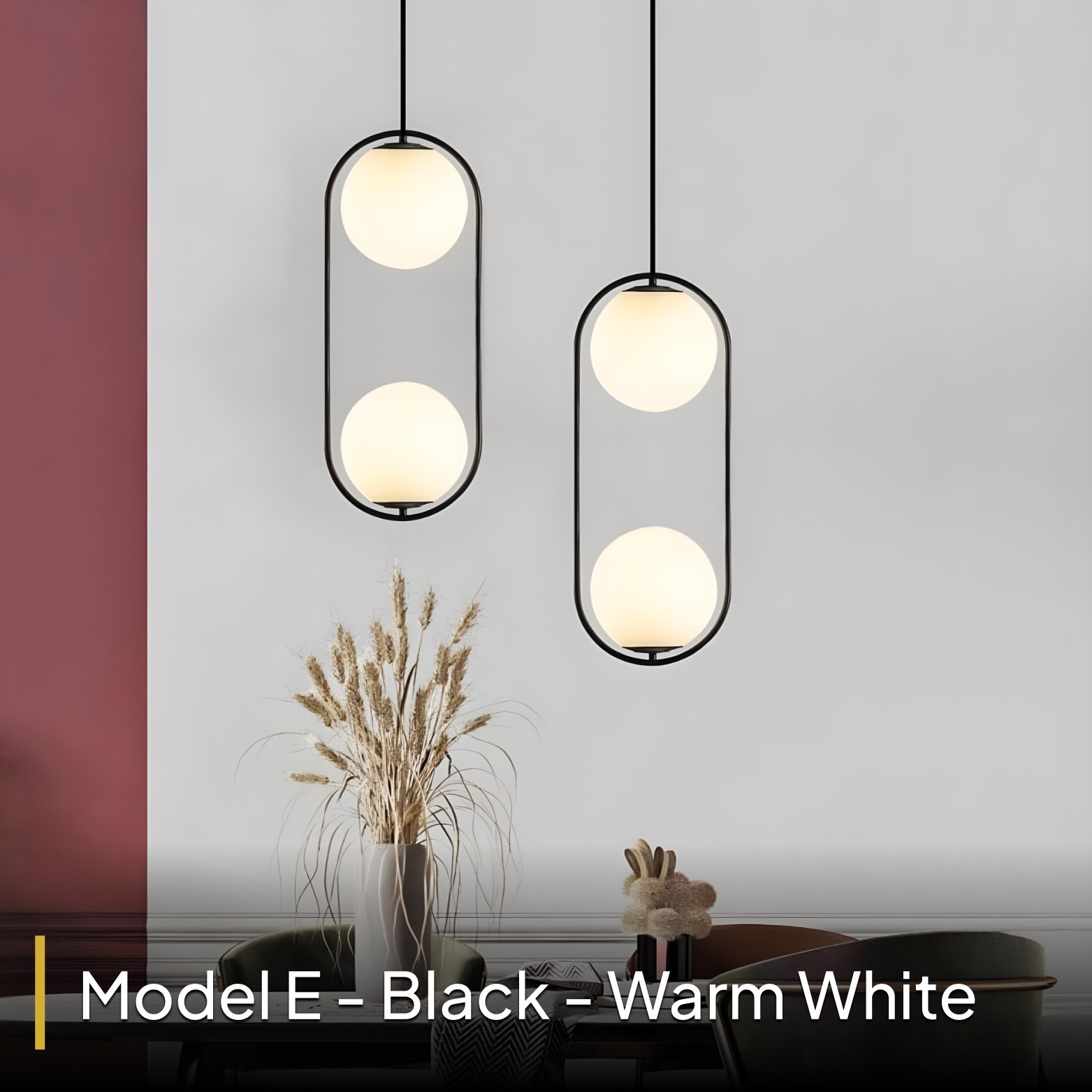 Modern pendant lights hanging in a room with a vase and decorative items on a table.